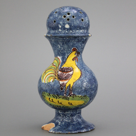 A rare Brussels faience caster with a rooster, 18th C.