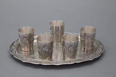 A fine Chinese silver tray with cups, 19th C.