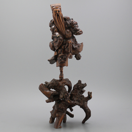 A pair of Chinese carved rootwood sculptures of immortals, 19th C. 