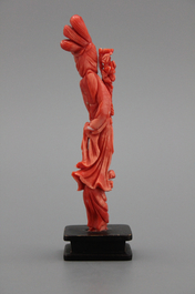A carved Chinese red coral figure of a Guanyin, 19/20th C.