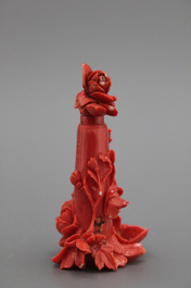 A carved Chinese red coral snuff bottle as a flower vase, 19th C.