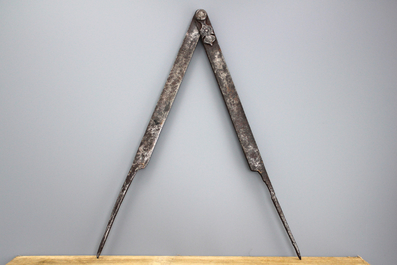 A large pair of iron compasses, 17/18th C.