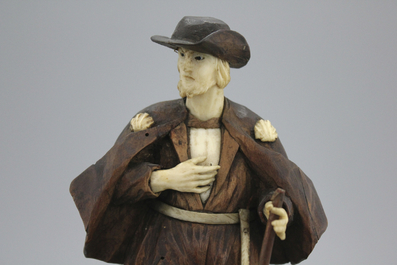 A carved wood and ivory figure of Saint Roch, in the manner of Simon Troger, 18th C.