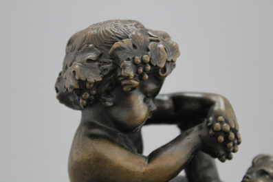 A bronze group depicting the young Bacchus , signed Clodion, 19th C.