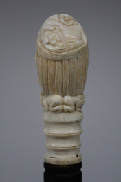 An erotical ivory and ebony walking cane, 19/20th C.