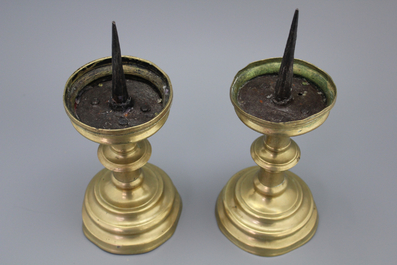 A pair of brass pricket candlesticks, 16th C.