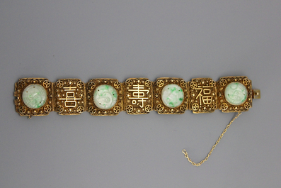 A Chinese gilt silver and jadeite bracelet, early 20th C.