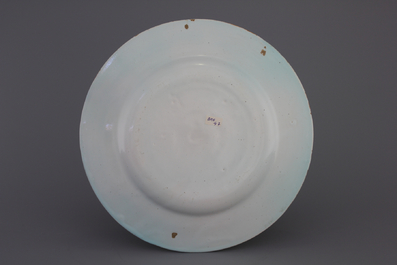 A Brussels faience round butterfly decor plate, 18th C.