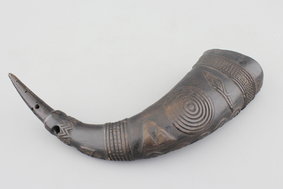 A large carved African Kuba drinking cup, carved and pierced buffalo horn, first half 20th C.