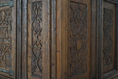 A Flemish oak credence with IHS panels, 16th C. with later adaptations