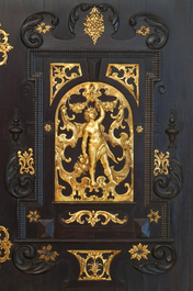 A South-German ebony veneer and gilded copper cabinet, 17th C.