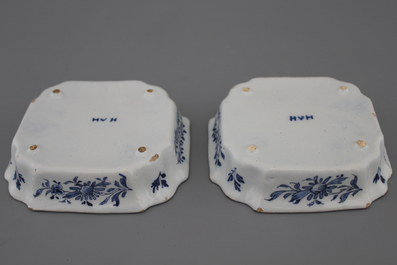 A pair of Dutch Delft blue and white flower holder stands, 18th C.