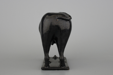 A black Delftware cow, 1st half 18th C.