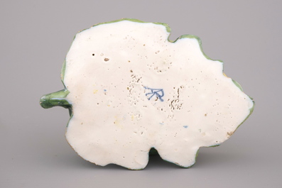 A Dutch Delft polychrome melon shaped tureen and cover, 18th C.