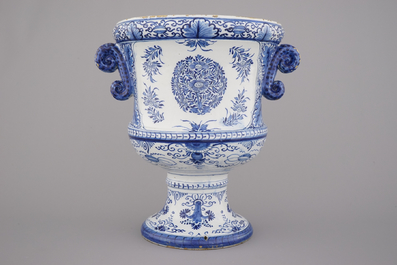 An impressive Dutch Delft blue and white footed garden urn, 18th C.