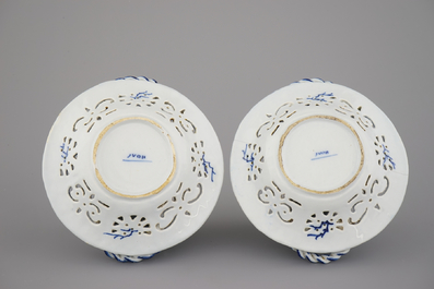 A pair of Dutch Delft blue and white open-worked baskets, 18th C.