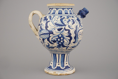 An Antwerp maiolica blue and white syrup jar with &quot;a foglie&quot; decor, ca. 1580