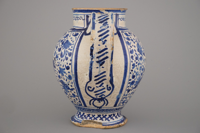 An early Antwerp maiolica blue, yellow and white syrup jar with sgraffiato decor, 1540-1580