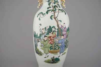 A Chinese porcelain vase with boys playing in a garden, 19/20th C.