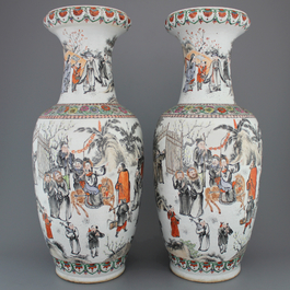 A pair of Chinese porelain famille rose vases with scholars, 19th C.
