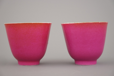 A pair of Chinese porcelain ruby ground wine cups, 19th C.