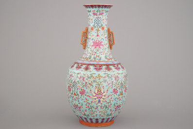 A Chinese porcelain turquoise ground famille rose &quot;Happiness&quot; vase, 20th C.