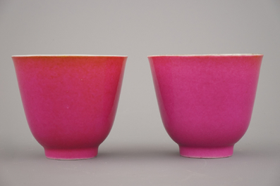 A pair of Chinese porcelain ruby ground wine cups, 19th C.