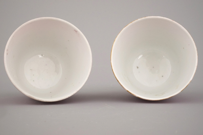A pair of Chinese porcelain ruby ground wine cups, 19th C.