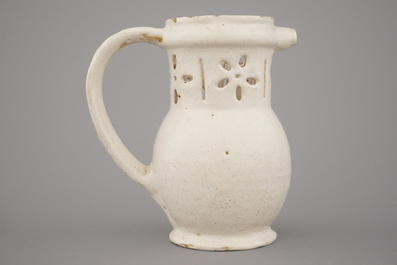 A white Delft puzzle jug, late 17th C.