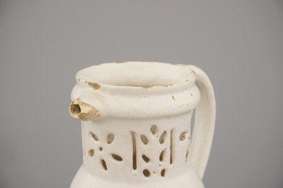 A white Delft puzzle jug, late 17th C.