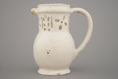 A white Delft puzzle jug, late 17th C.