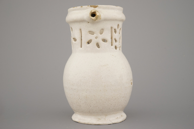 A white Delft puzzle jug, late 17th C.