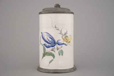A polychrome French faience pewter mounted mug, 18th C.