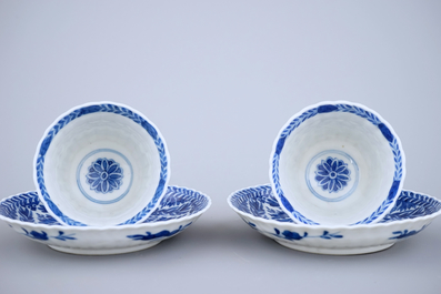 A pair of Chinese porcelain blue and white cups and saucers, Guangxu