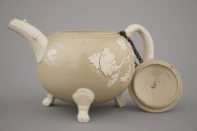 An English stoneware teapot with applied leaves and vines, 18/19th C.