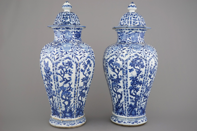 A pair of Chinese porcelain blue and white vases and covers, Kangxi, ca. 1700