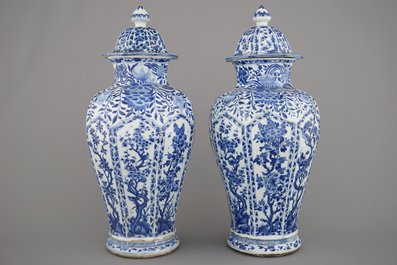 A pair of Chinese porcelain blue and white vases and covers, Kangxi, ca. 1700