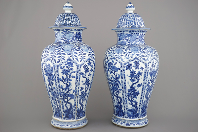 A pair of Chinese porcelain blue and white vases and covers, Kangxi, ca. 1700