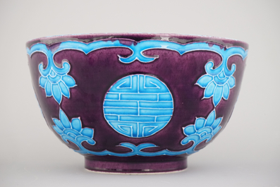 A Chinese porcelain fahua relief-decorated bowl, 19th C.