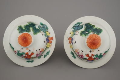 A pair of Chinese porcelain famille rose vases with &quot;Hundred Boys&quot; decor, 19th C.