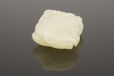 A Chinese celadon carved jade fish, Qing dynasty