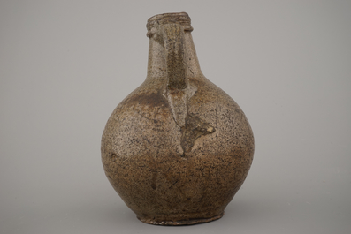 A Raeren stoneware bellarmine jug, 17th C.