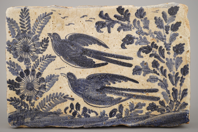 A pair of large Spanish blue and white tiles with birds, 17/18th C.