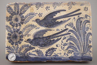 A pair of large Spanish blue and white tiles with birds, 17/18th C.