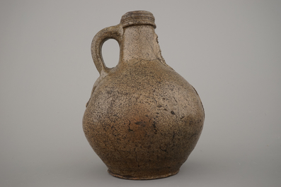 A Raeren stoneware bellarmine jug, 17th C.