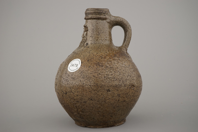 A Raeren stoneware bellarmine jug, 17th C.