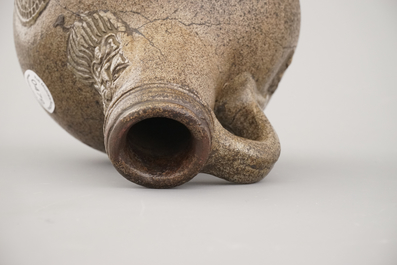 A Raeren stoneware bellarmine jug, 17th C.