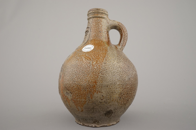 A Raeren stoneware armorial bellarmine jug, 17th C.
