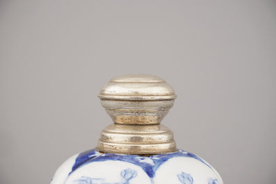 A Chinese porcelain blue and white vase with silver mounts, 20th C.