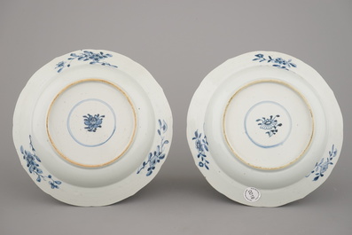 A pair of Chinese porcelain blue and white plates with landscape decoration, 18th C.